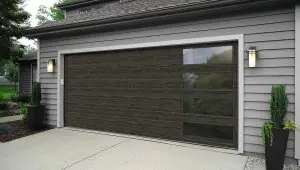 front view of a modern steel grey garage door by Quality Overhead Door